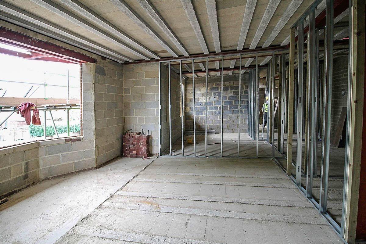 concrete block wall Hodford Road beam and block room with SFS steel stud partitions and steel bay window lintel