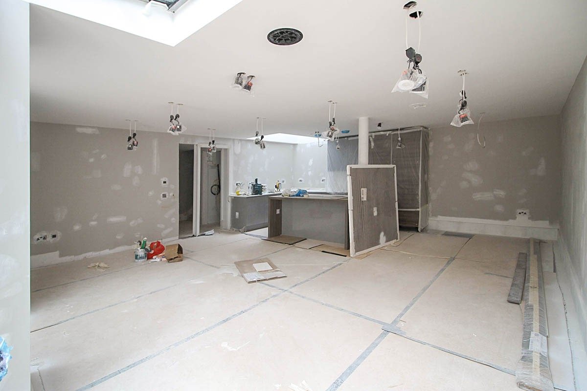 Kitchen lounge Hodford Road under construction being decorated and sanded down with grey walls